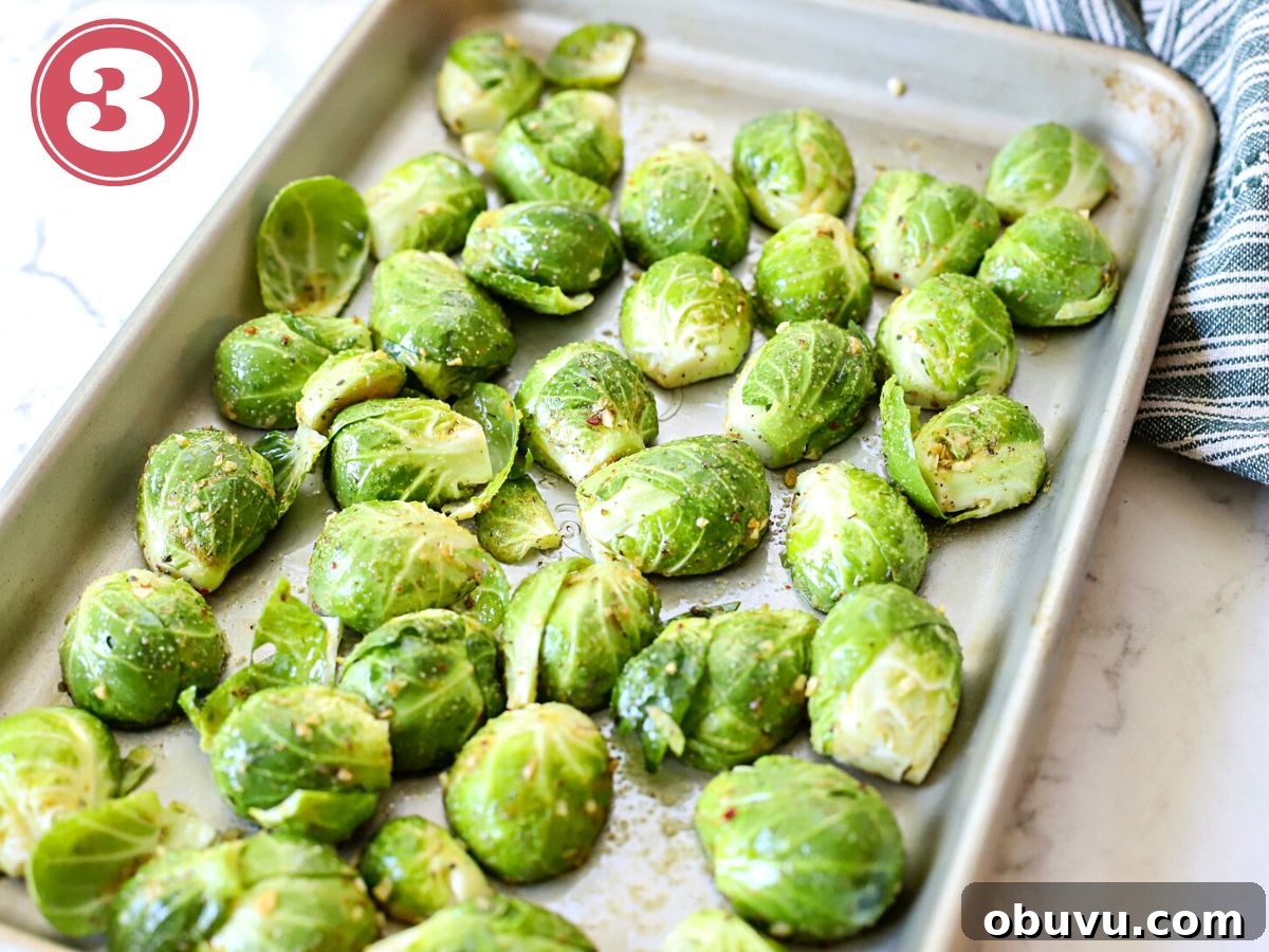 Crispy Oven-Roasted Brussels Sprouts with Balsamic Glaze 8 Cut brussels on a roasting pan with olive oil and salt.