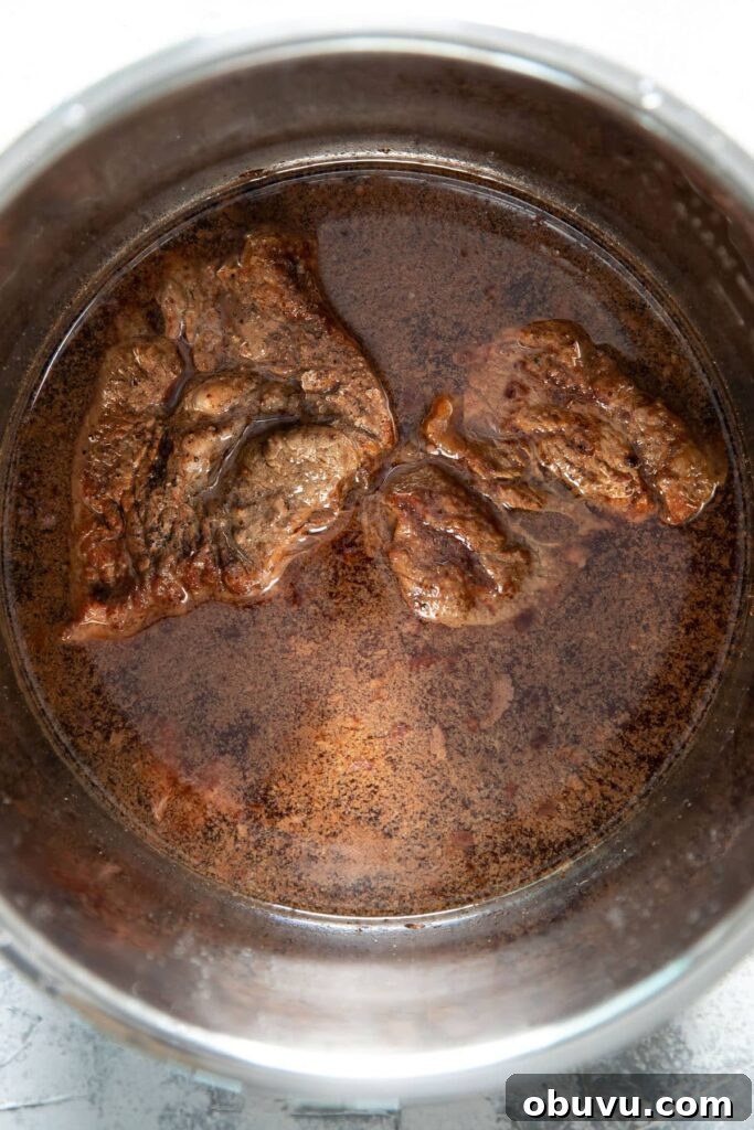 cooked pot roast in an instant pot