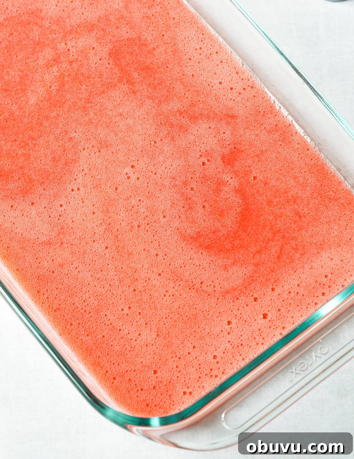 Strawberry & Passion Fruit Granita Recipe for Summer Refreshment 6 strawberry passion fruit juice in a baking dish.