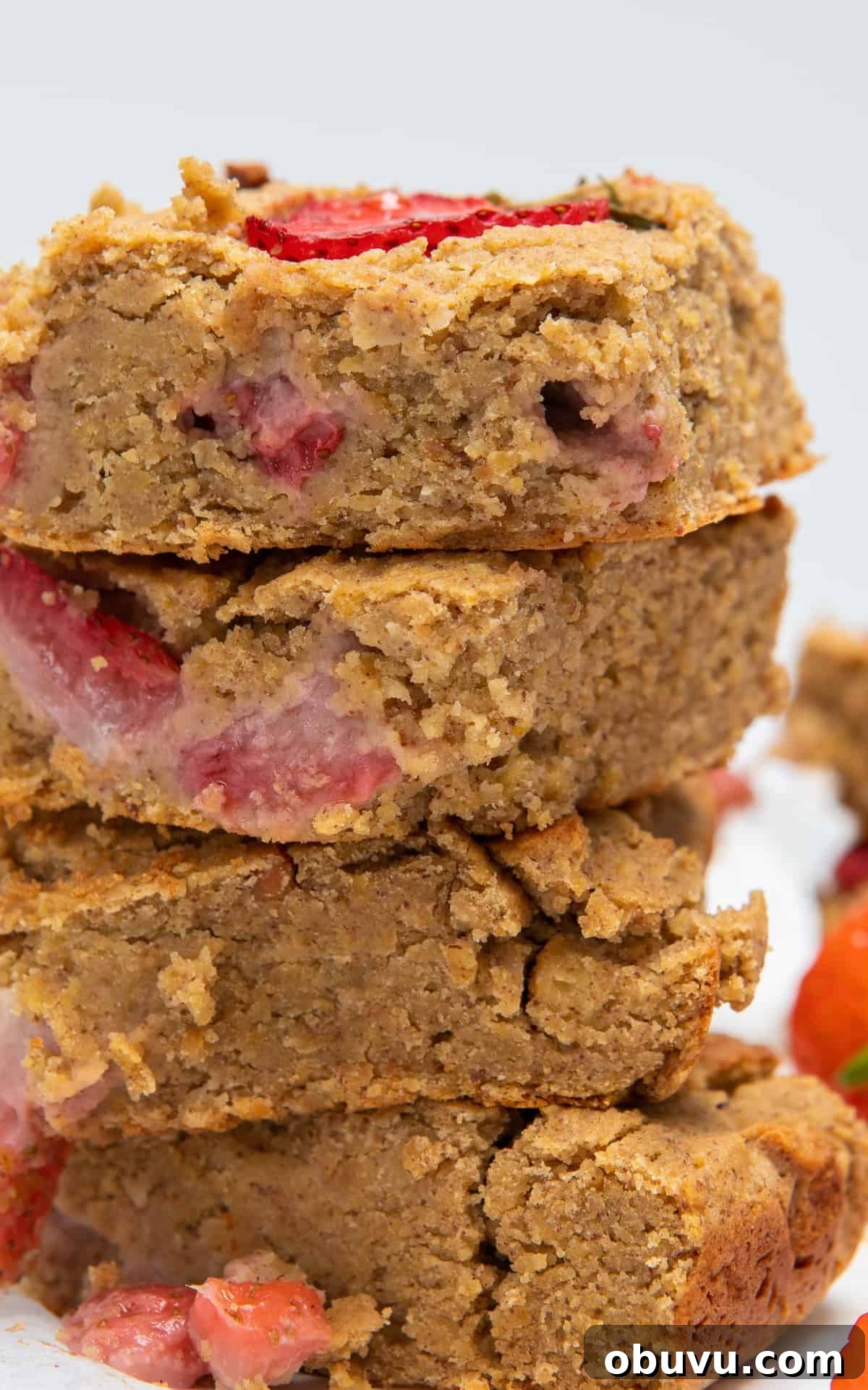 Chewy Peanut Butter Blondies Recipe for Rich, Gooey Bars 7 Peanut Butter Blondies slices stacked.