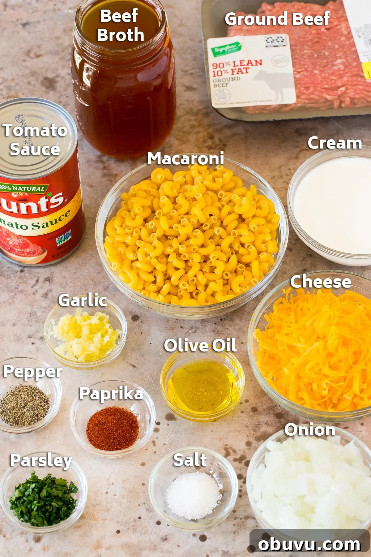 Copycat Hamburger Helper Recipe: Homemade Cheesy Beef Skillet 3 Bowls of ingredients including macaroni, cheese, seasonings and a package of ground beef.