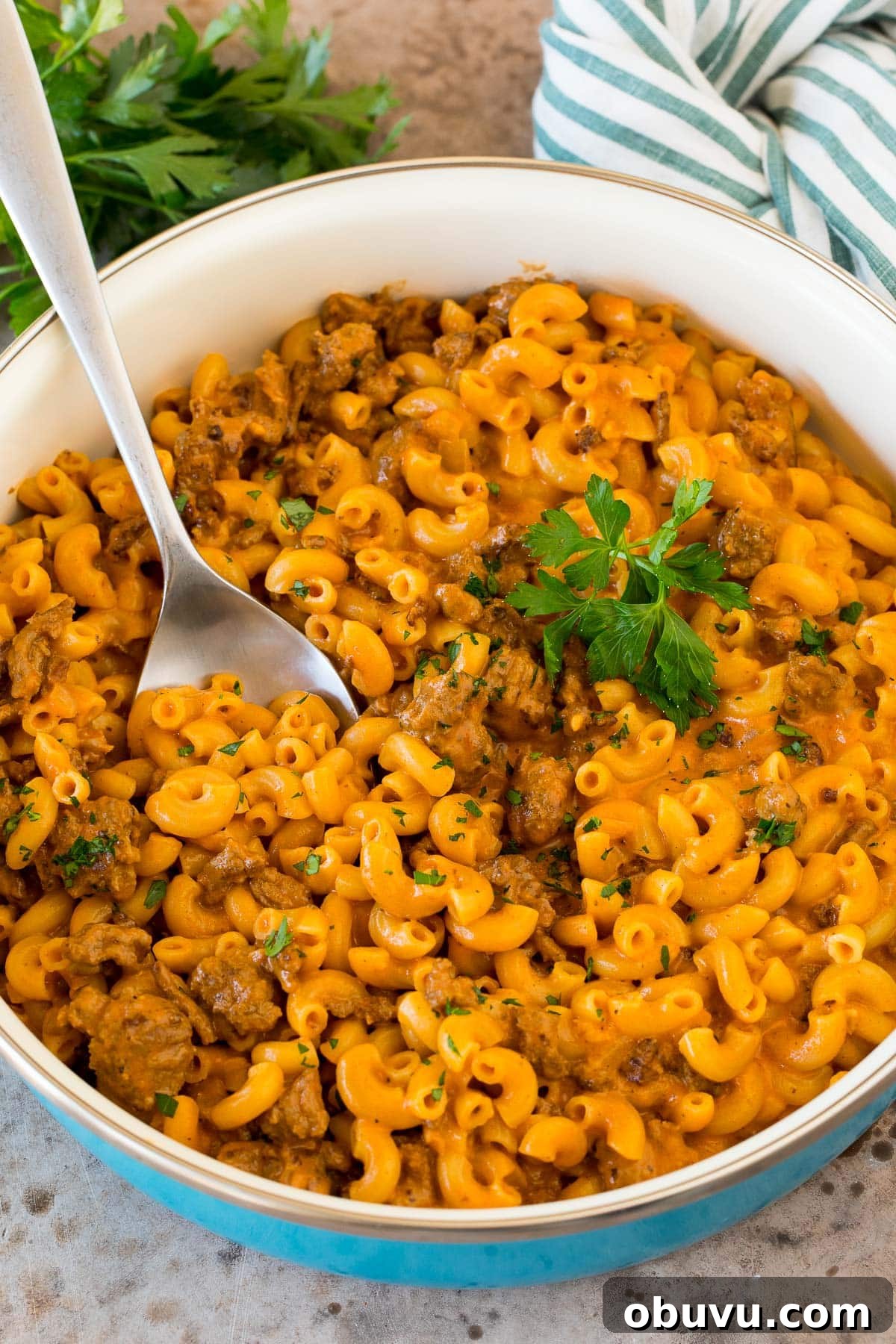 Copycat Hamburger Helper Recipe: Homemade Cheesy Beef Skillet 6 A pan of homemade hamburger helper with a spoon in it.