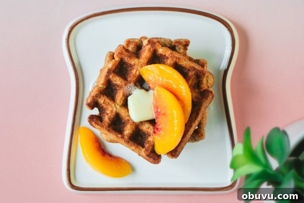 Peach Oat Pancakes & Waffles: Fluffy, Fruit-Studded Recipes 6 peach oat waffles served with butter and peach slices