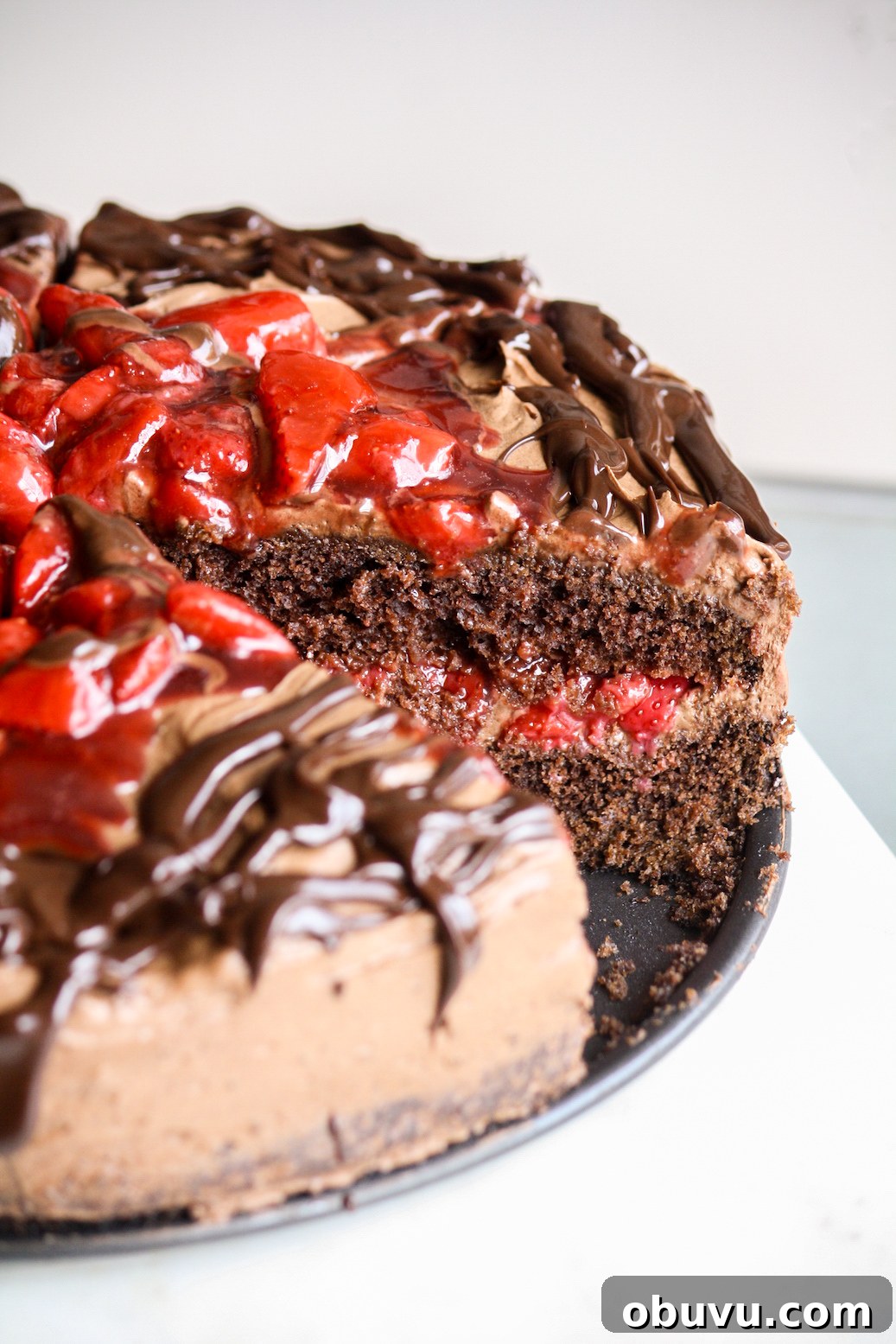Decadent Chocolate Strawberry Layer Cake Recipe 4 Simple chocolate cake layered with roasted strawberries and whipped ganache frosting