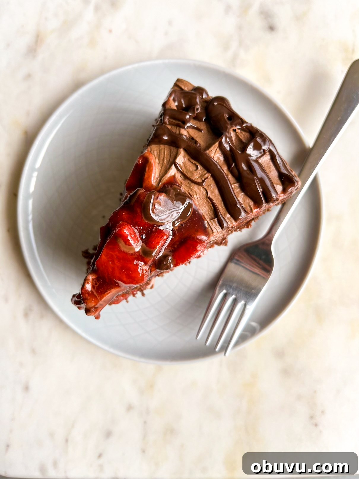 Decadent Chocolate Strawberry Layer Cake Recipe 9 Simple chocolate cake layered with roasted strawberries and whipped ganache frosting