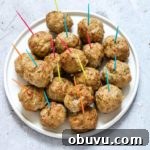 Air Fryer Meatballs (Turkey Meatballs) on a plate with coloured toothpics