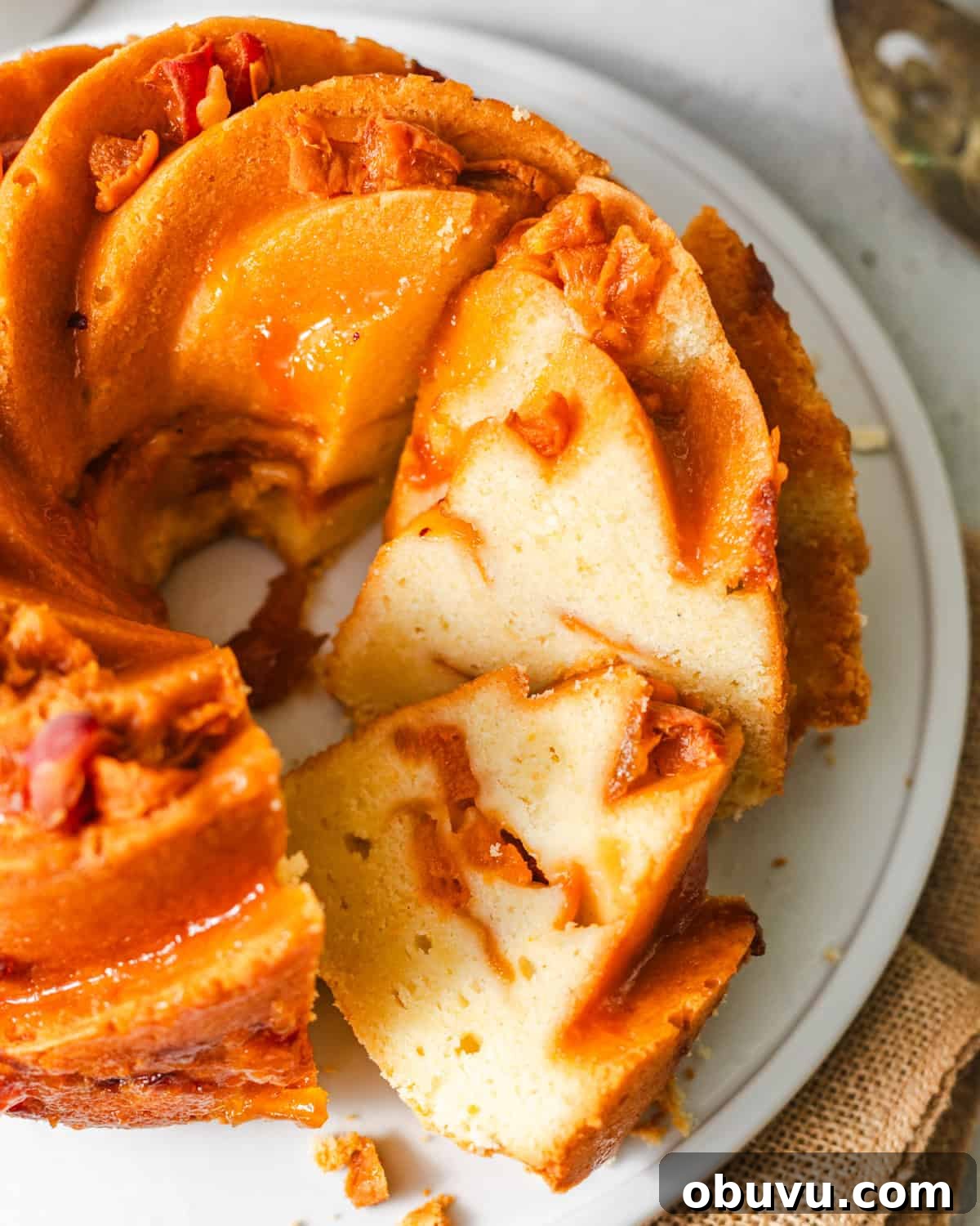 sliced apricot cake on a plate.