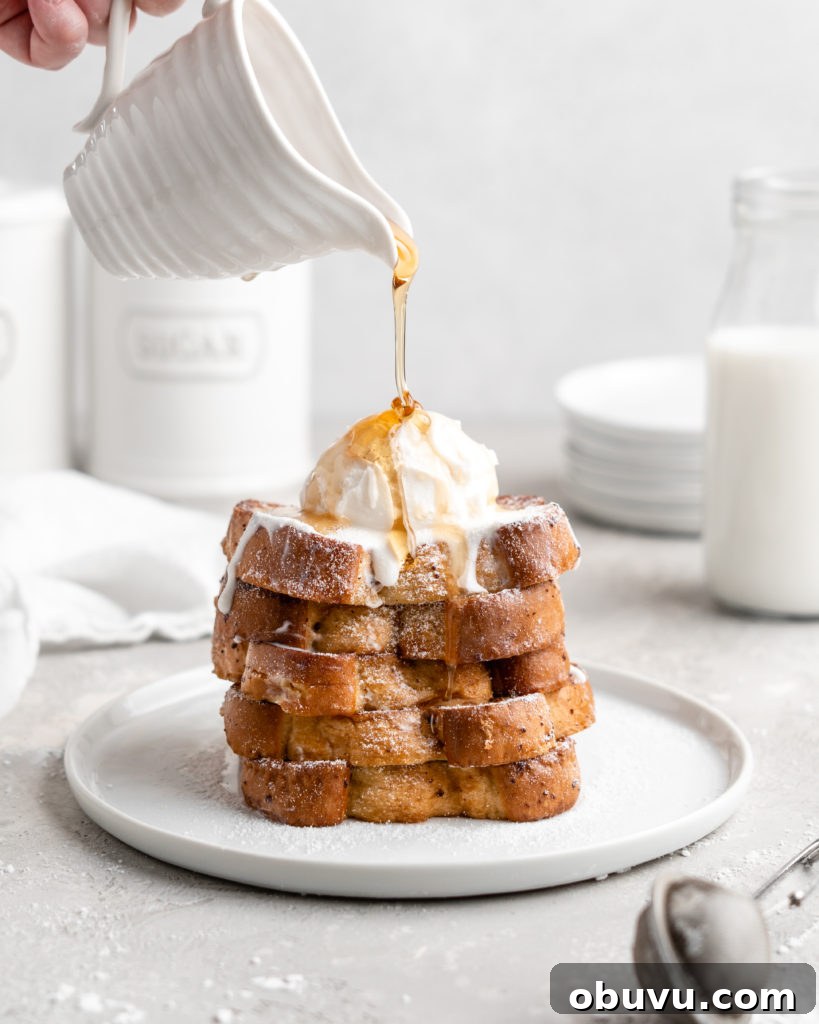 Decadent Buttermilk French Toast Recipe for Brunch 2 Thick slices of Grand Marnier infused buttermilk French Toast, topped with ice cream and syrup
