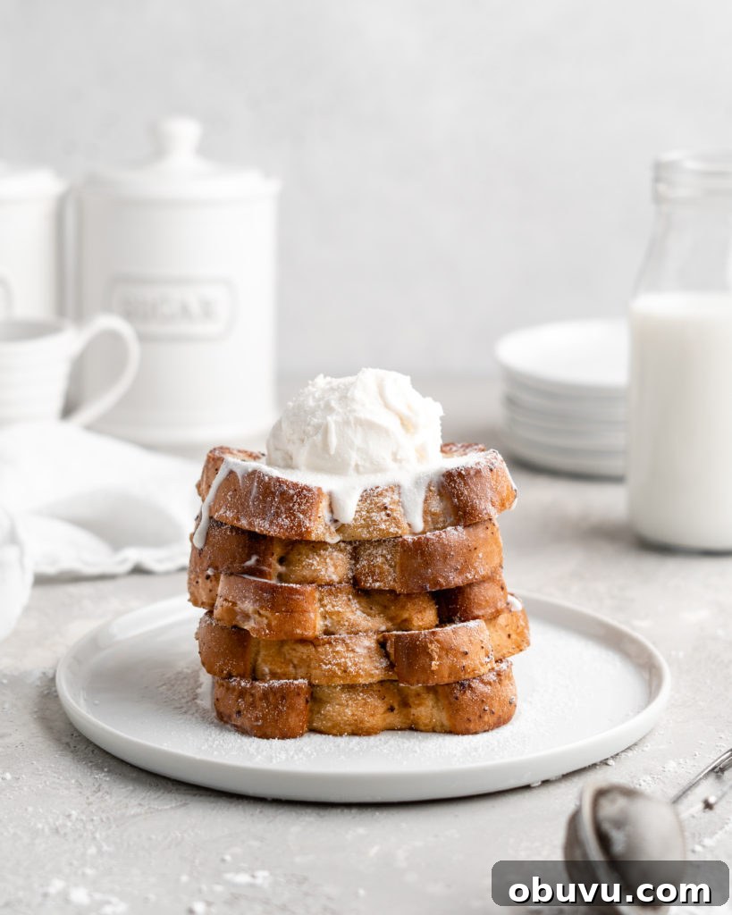 Decadent Buttermilk French Toast Recipe for Brunch 3 Thick slices of Grand Marnier infused buttermilk French Toast, topped with ice cream and syrup