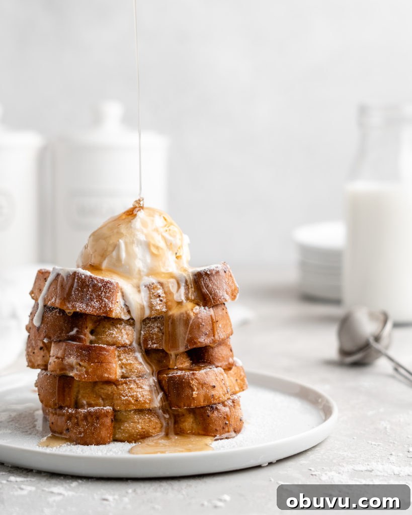 Decadent Buttermilk French Toast Recipe for Brunch 4 Thick slices of Grand Marnier infused buttermilk French Toast, topped with ice cream and syrup