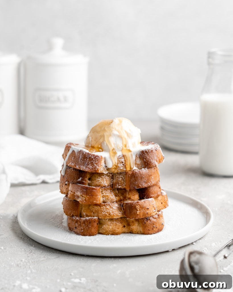 Decadent Buttermilk French Toast Recipe for Brunch 7 Thick slices of Grand Marnier infused buttermilk French Toast, topped with ice cream and syrup