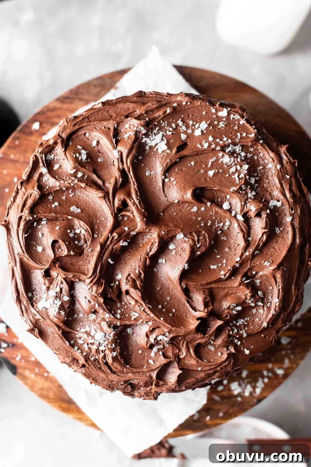 Decadent Gluten-Free Chocolate Cake Recipe 11 decorated gluten free chocolate cake on cake stand (1)