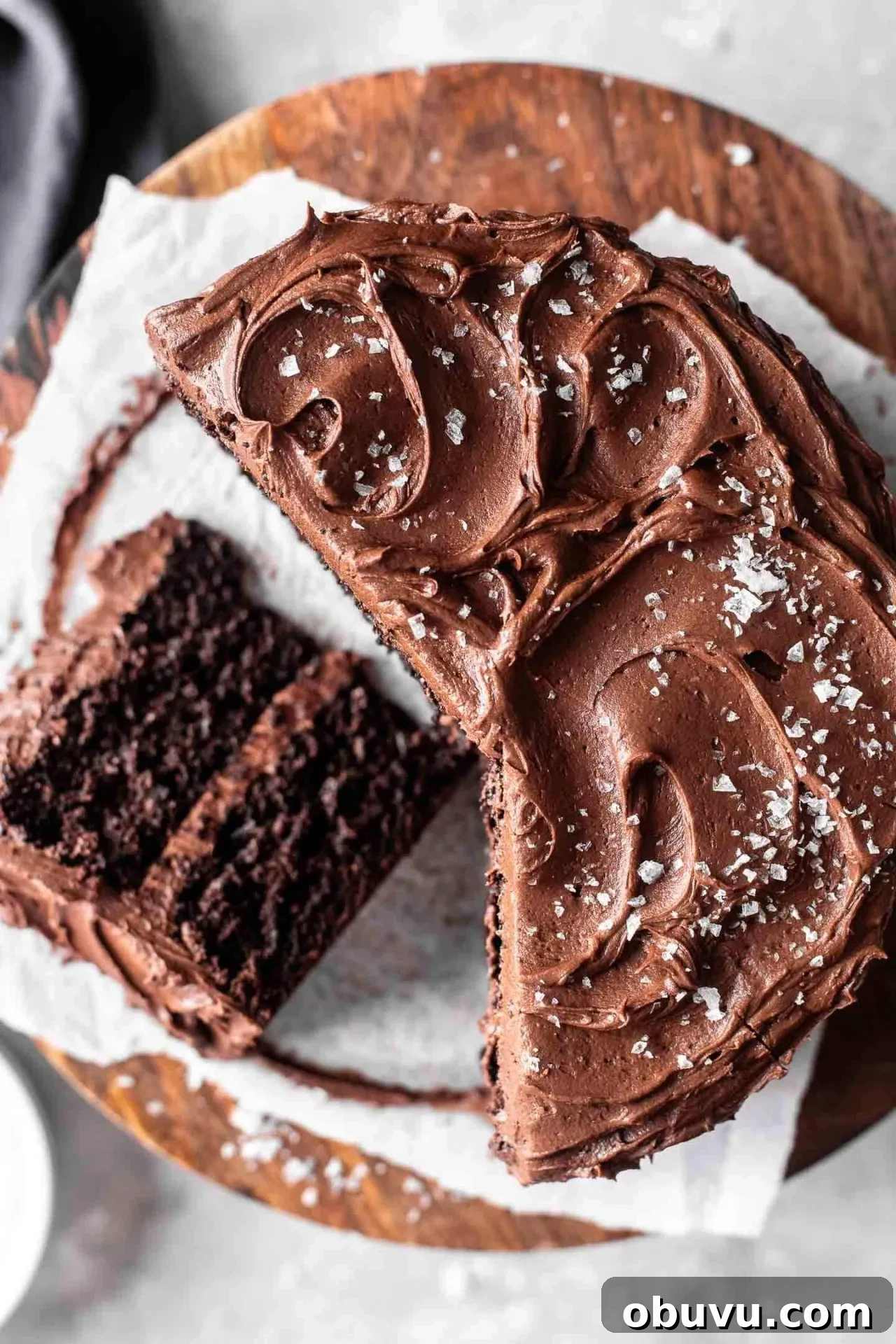 Decadent Gluten-Free Chocolate Cake Recipe 12 sliced gluten free chocolate cake on cake stand (5)