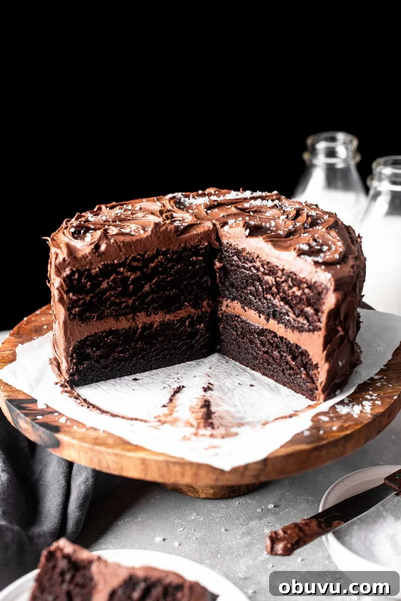 Decadent Gluten-Free Chocolate Cake Recipe 13 sliced gluten free chocolate cake on cake stand (3)