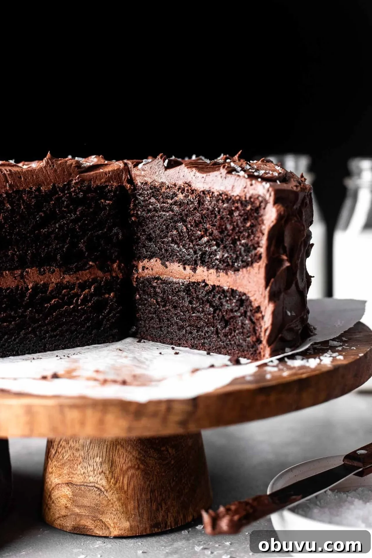 Decadent Gluten-Free Chocolate Cake Recipe 10 sliced gluten free chocolate cake on cake stand (6)