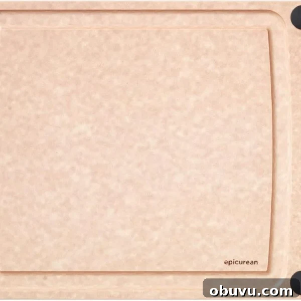 A rectangular, light brown cutting board