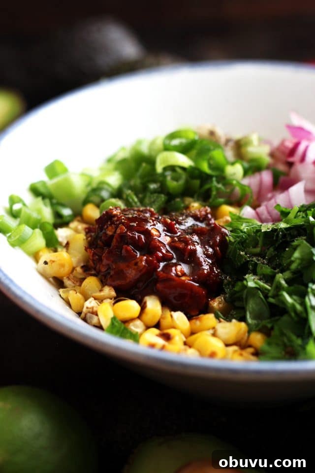 Vegan Tempeh Tacos with Savory Meat Filling 4 Chipotle Corn Salsa Ingredients in a Bowl Side Angle