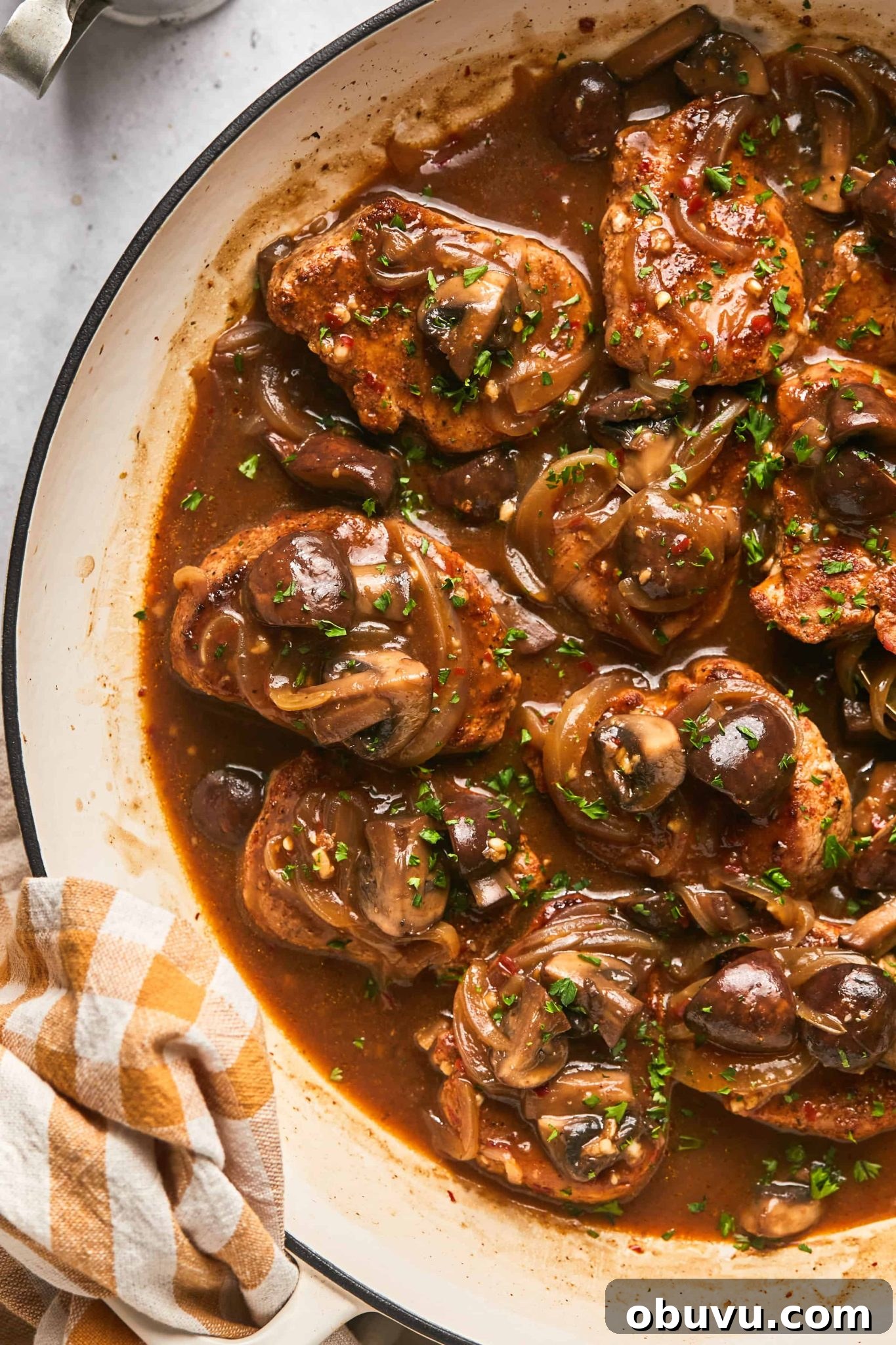 Pork Medallions with Caramelized Onions and Mushrooms 2 Pork medallions with mushrooms and onions