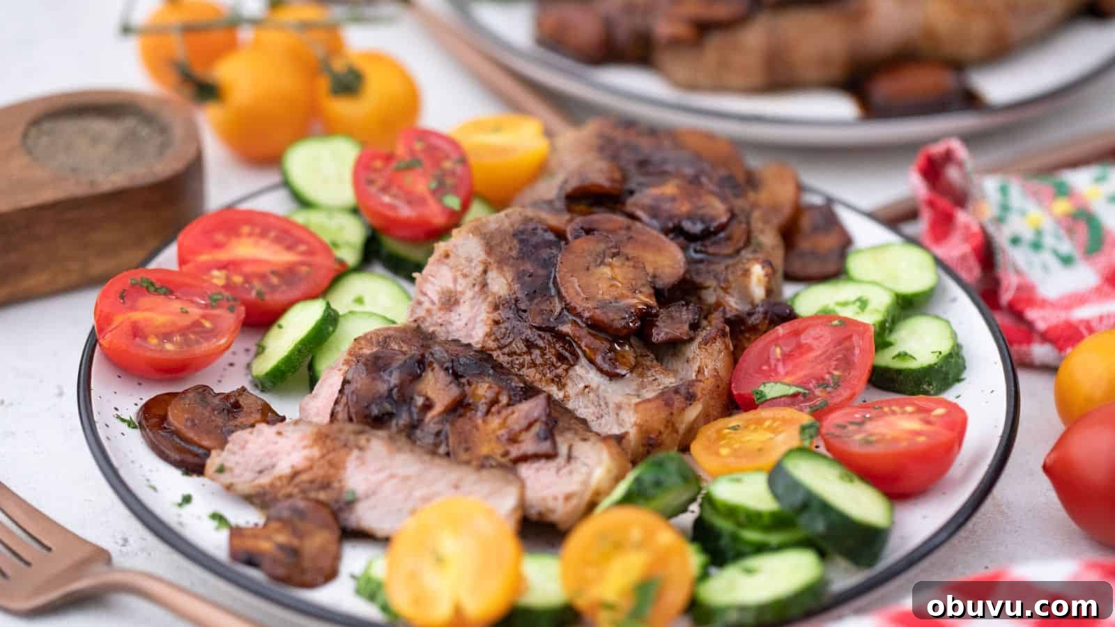 29 Delicious Low-Carb Meals That Aren’t Just Salad 14 A plate with steak, tomatoes and cucumbers on it.