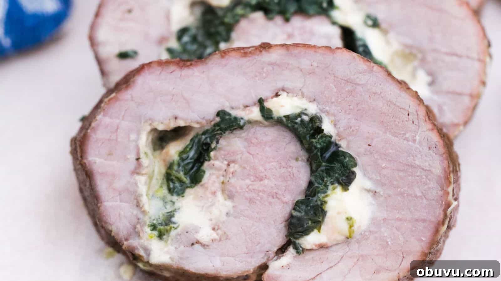 29 Delicious Low-Carb Meals That Aren’t Just Salad 17 Stuffed steak pinwheels sliced on platter.