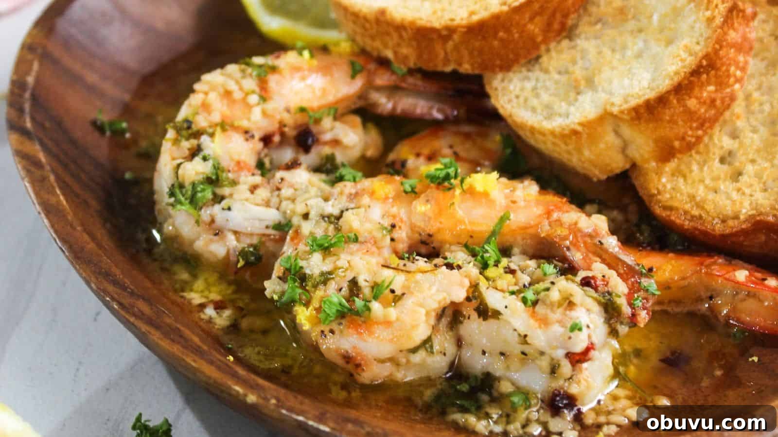 29 Delicious Low-Carb Meals That Aren’t Just Salad 28 A plate with shrimp and bread on it.