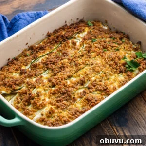 Zucchini and Potatoes al Forno: Crispy Oven-Baked Vegetable Side 7 Zucchini potato al forno on wooden table.