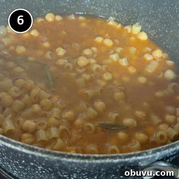 The pasta e ceci simmering in a pot
