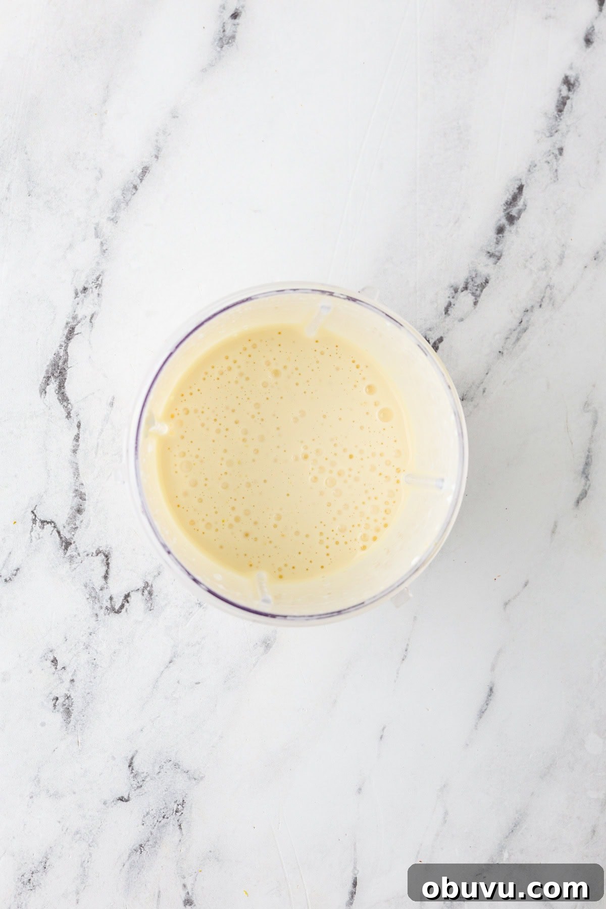 An overhead image of blending the wet ingredients together.