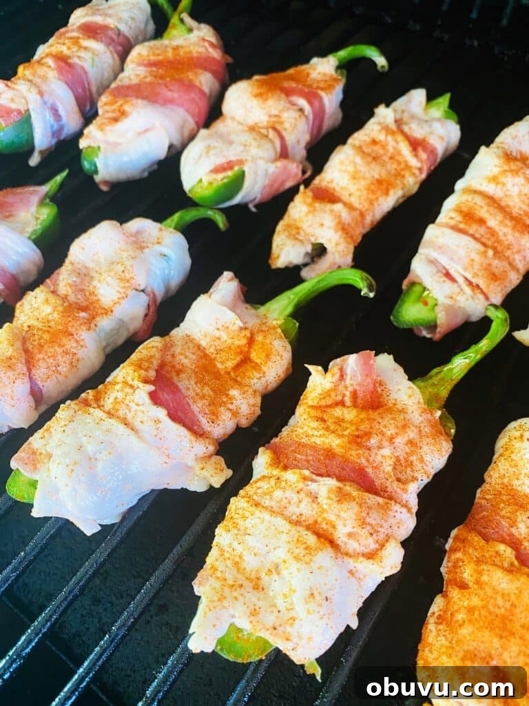 Smoked Honey Jalapeño Poppers with Creamy Cheese Filling 8 peppers on the smoker before cooking