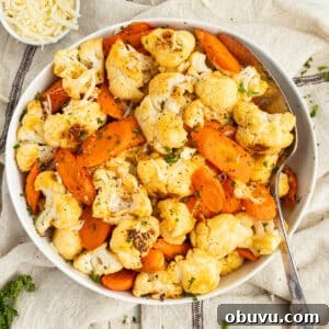 Roasted Carrots and Cauliflower in Cheesy Garlic Crust 10 This is a square picture of cheesy roasted carrots and cauliflower.