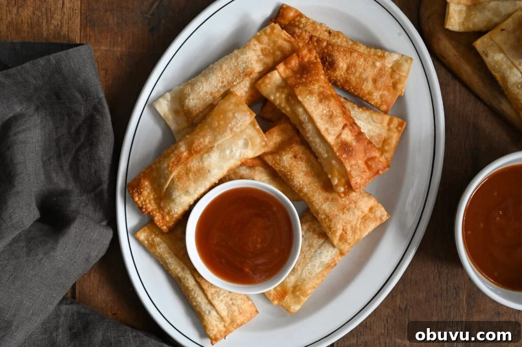 Crispy Vegetarian Egg Rolls with Tangy Dipping Sauce 2 Learn how to make easy vegetarian egg rolls with our family recipe.