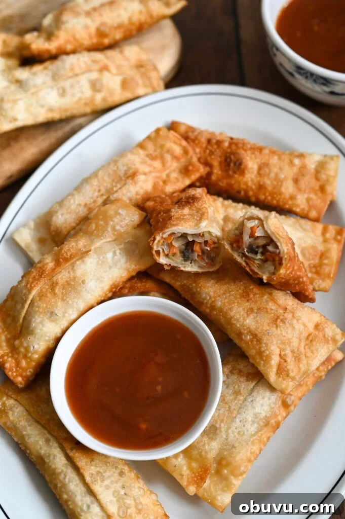 Crispy Vegetarian Egg Rolls with Tangy Dipping Sauce 11 Learn how to make easy vegetarian egg rolls with our family recipe.