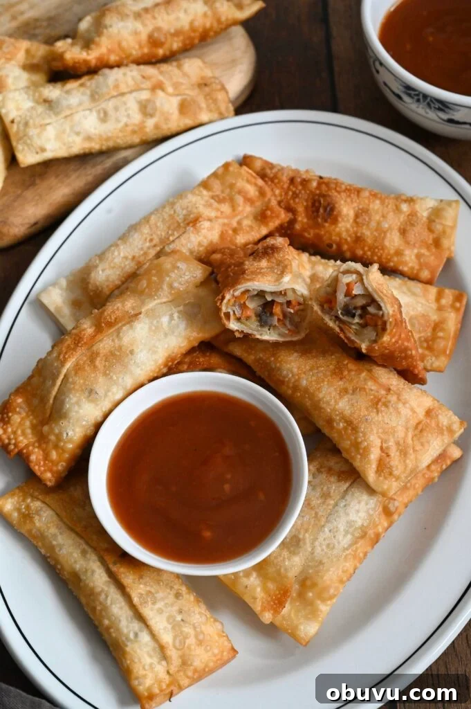Crispy Vegetarian Egg Rolls with Tangy Dipping Sauce 13 Learn how to make easy vegetarian egg rolls with our family recipe.