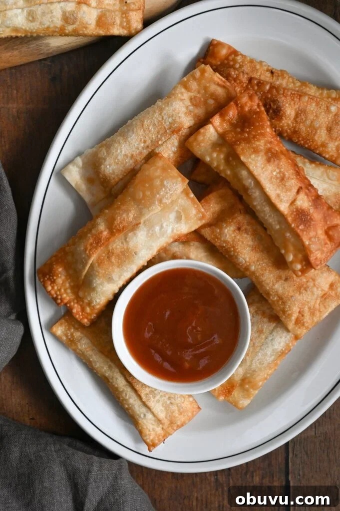 Crispy Vegetarian Egg Rolls with Tangy Dipping Sauce 4 Learn how to make easy vegetarian egg rolls with our family recipe.