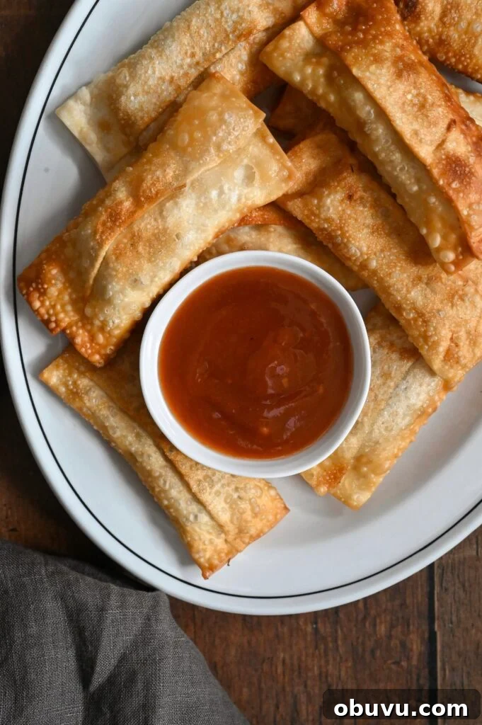 Crispy Vegetarian Egg Rolls with Tangy Dipping Sauce 5 Learn how to make easy vegetarian egg rolls with our family recipe.