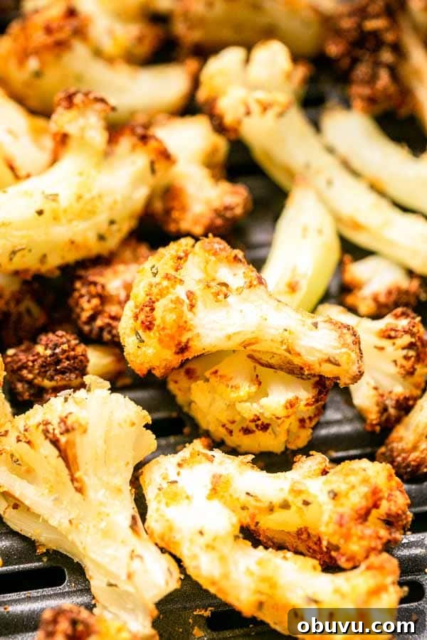 Crispy Air Fryer Frozen Cauliflower in 15 Minutes 4 This Air Fryer frozen cauliflower recipe turns into the most delicious roasted cauliflower. A great side dish that is on the table in no time. No mushy smells while cooking. Season with your favorite seasoning. A new family favorite.