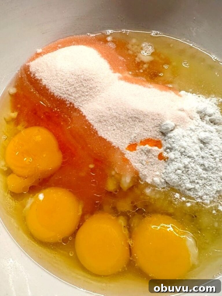 Irresistible Peach Cake Recipe You'll Make Again and Again 5 peach cake ingredients in a bowl