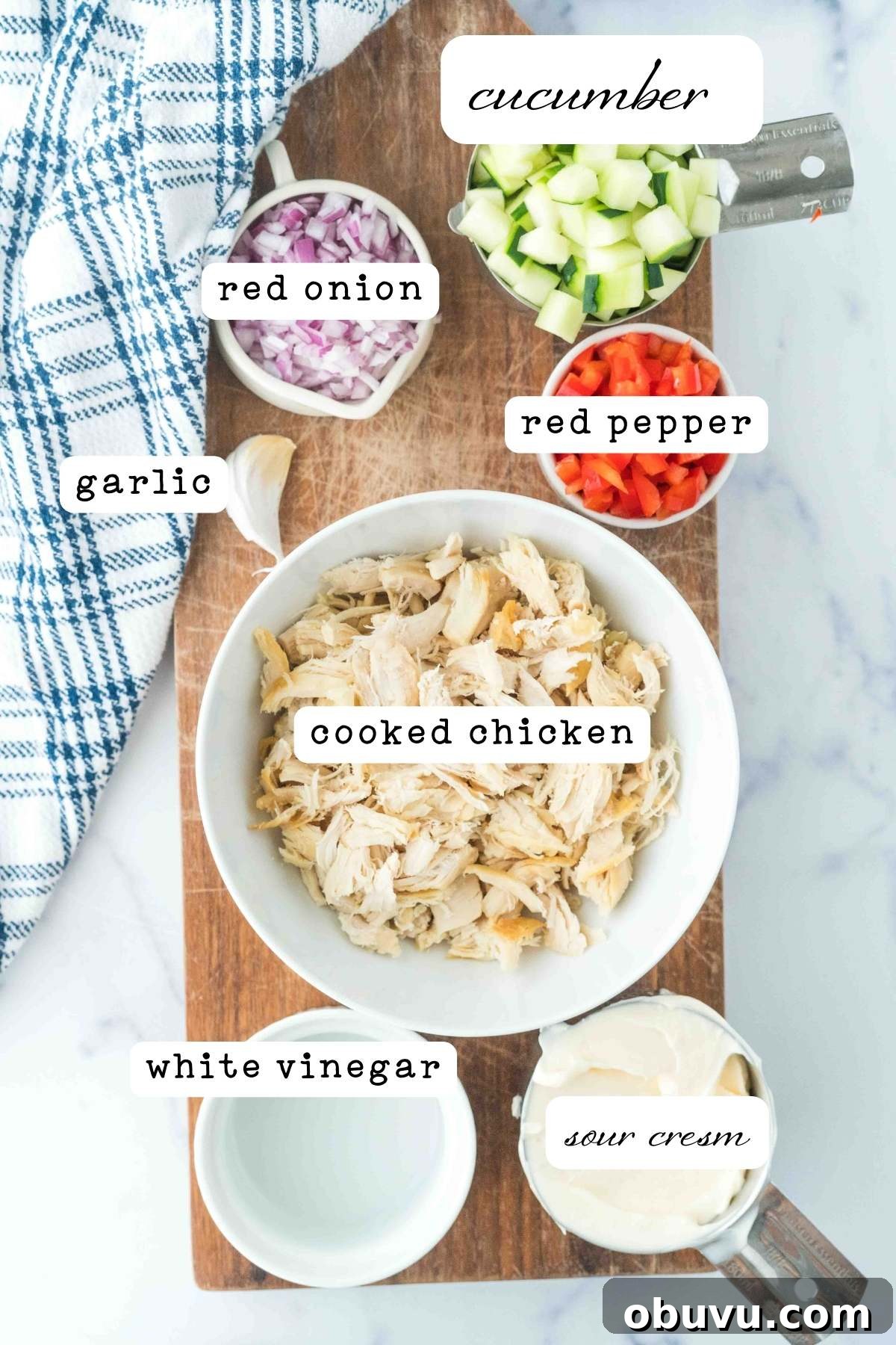 Chilled Cucumber and Chicken Salad with Creamy Dill Dressing 3 ingredients on marble counter.