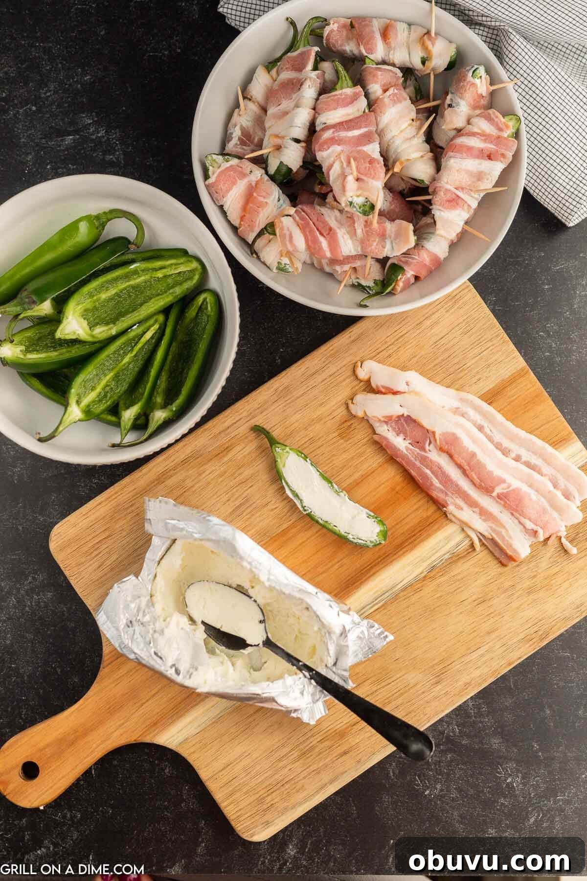 Smoky Grilled Jalapeño Poppers with Cream Cheese Filling 5 Spread the cream cheese on the jalapenos with a spoon