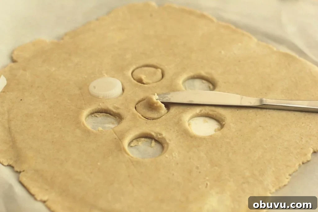 cutting holes in the top crust