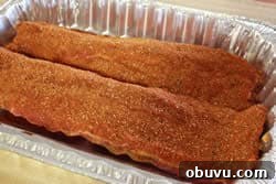 Sticky Smoked Ribs with Savory BBQ Sauce 4 Sprinkle ½ cup of rub on each rack of rib