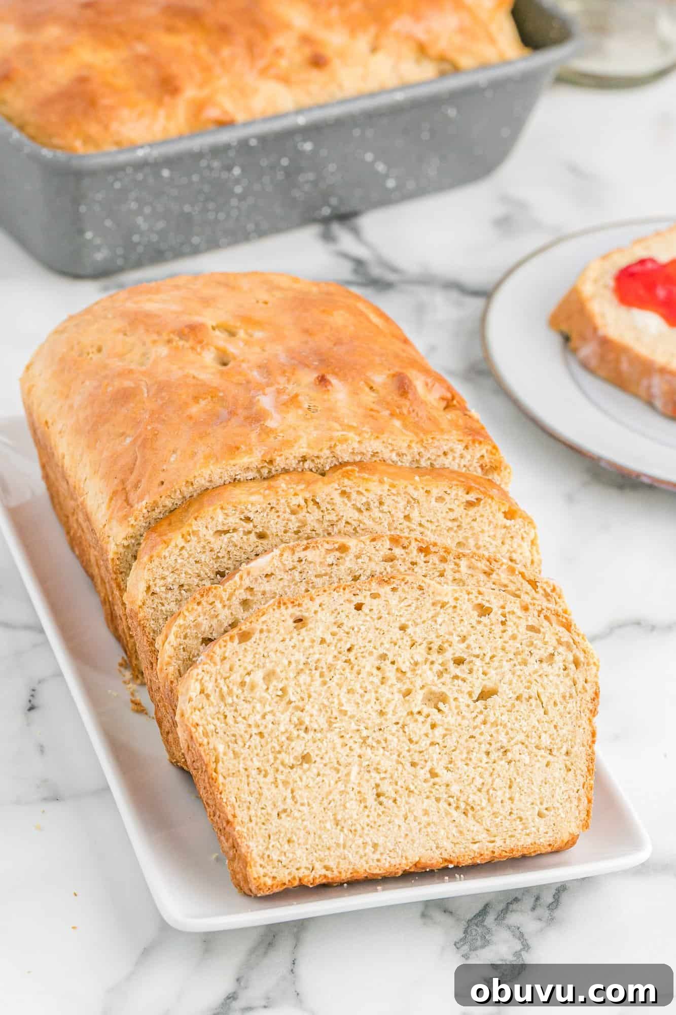 Sliced bread on platter.