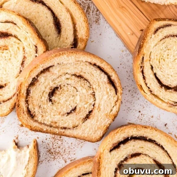 Cinnamon swirl bread cut into slices.