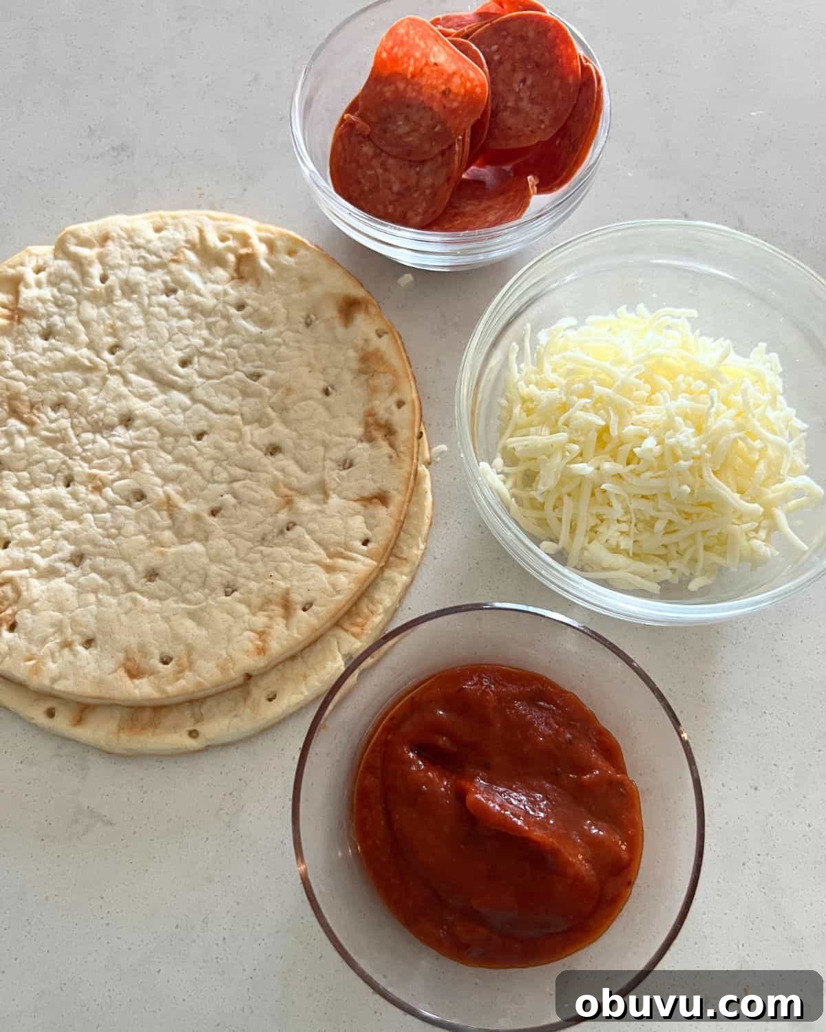 Ingredients needed for air fryer pita pizzas. 