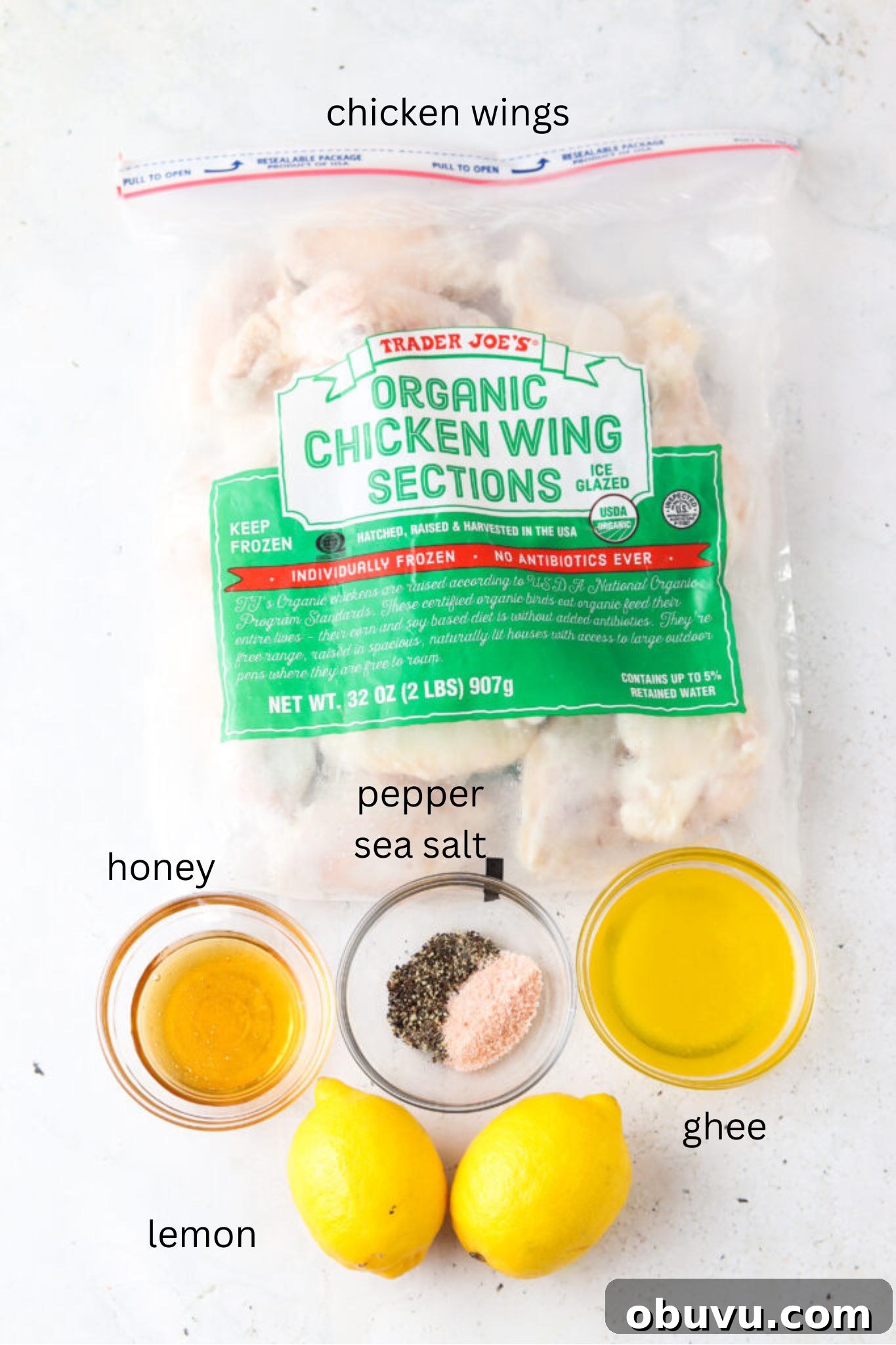 Honey Lemon Pepper Chicken Wings Recipe for Crispy Flavor 2 Honey lemon pepper chicken wing ingredients in glass bowls.