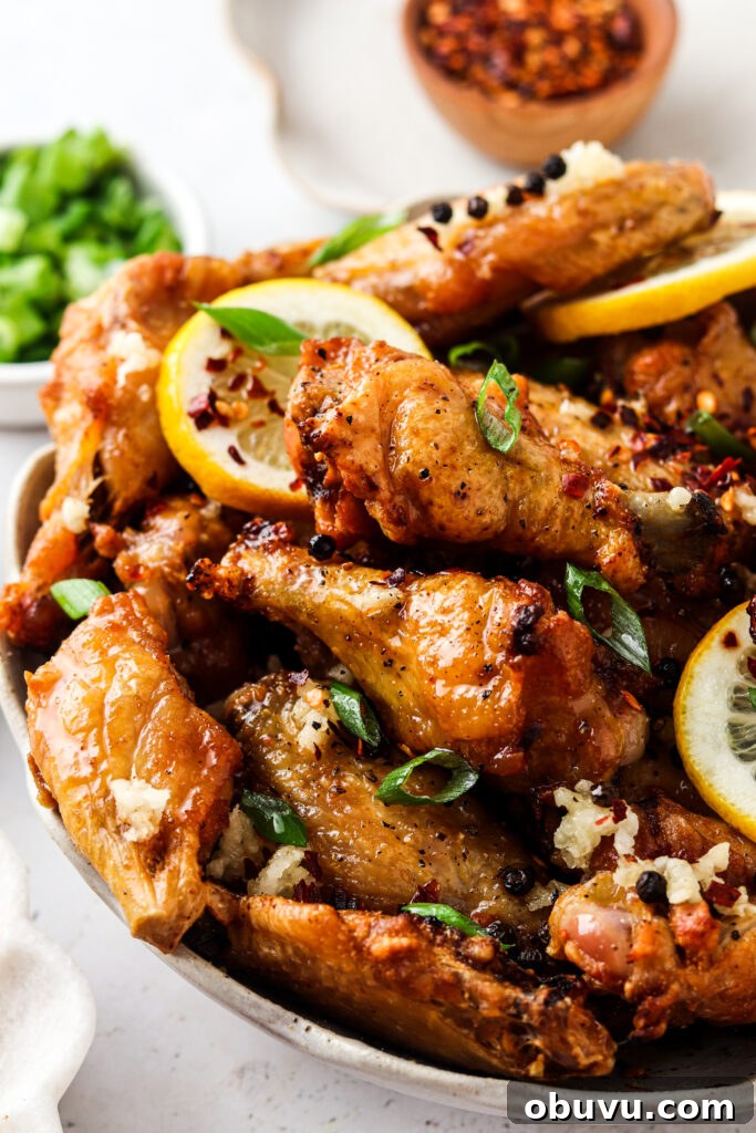 honey lemon pepper wings 2 side shot of honey lemon pepper wings in a bowl