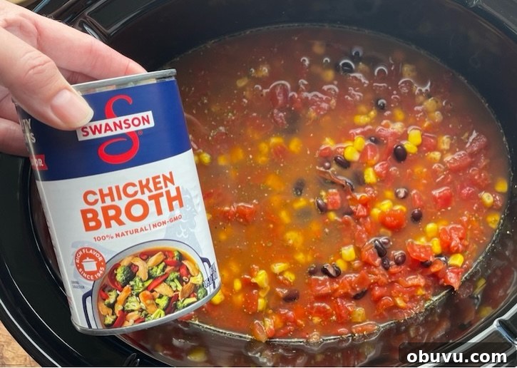 Creamy Chicken Taco Soup Recipe for Cozy Weeknight Dinners 6 Step by step photo of making cheesy chicken taco soup.