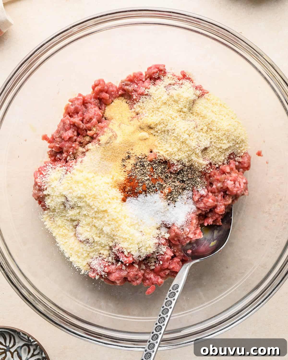 Gluten-Free Italian Meatballs Recipe – Tender & Flavorful 9 how to make Gluten Free Meatballs - adding dry ingredients added before mixing
