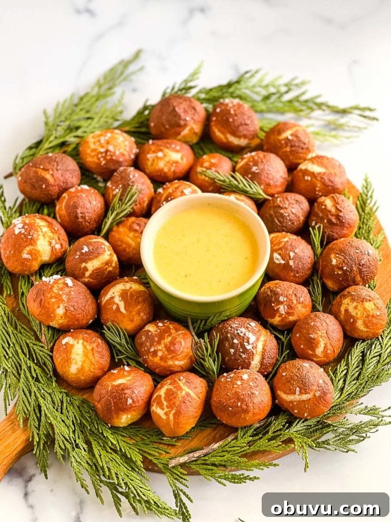 a circle of soft pretzel bites with cheese.
