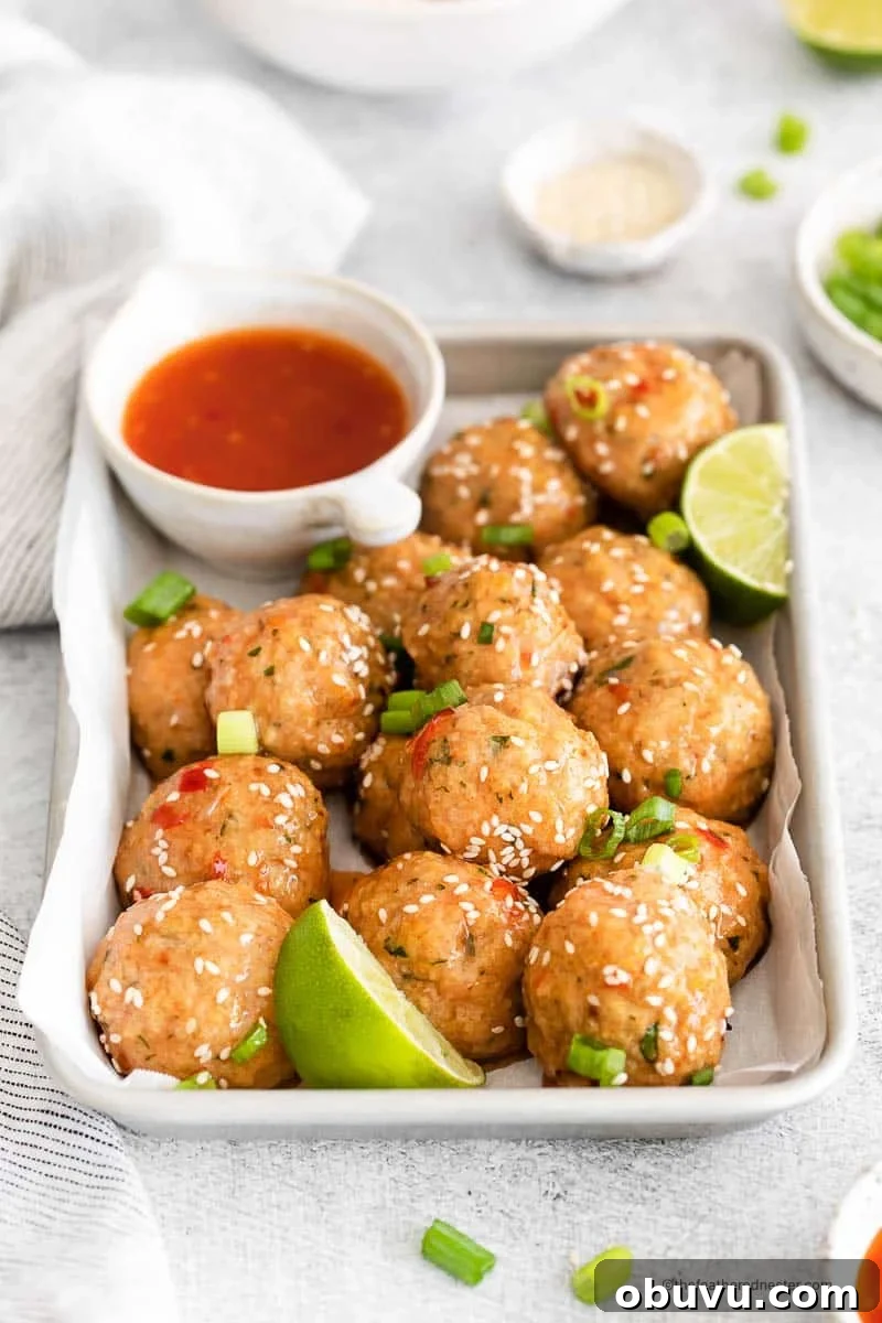 40+ Crowd-Pleasing Finger Food Ideas for Parties and Gatherings 22 honey sriracha meatballs with dipping sauce.